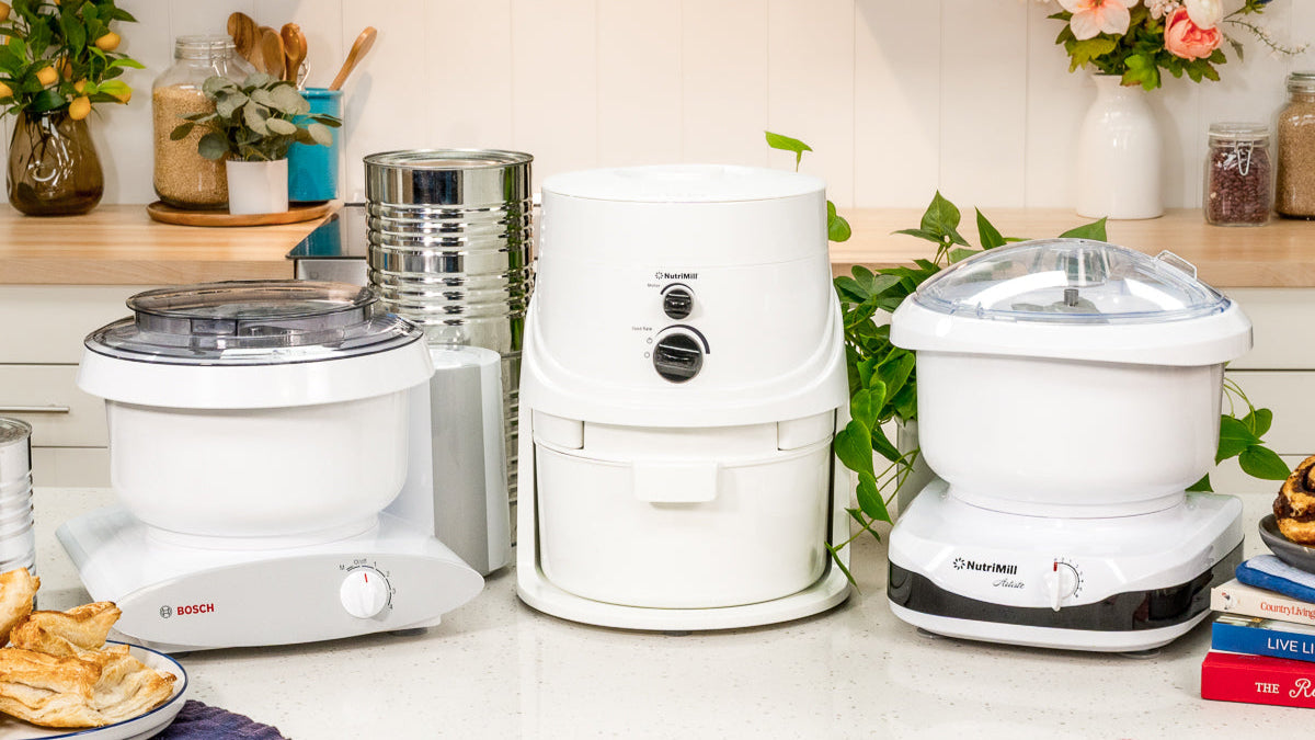 Bosch Universal Plus vs NutriMill Artiste: Best Stand Mixer for Bread Dough & Home Baking