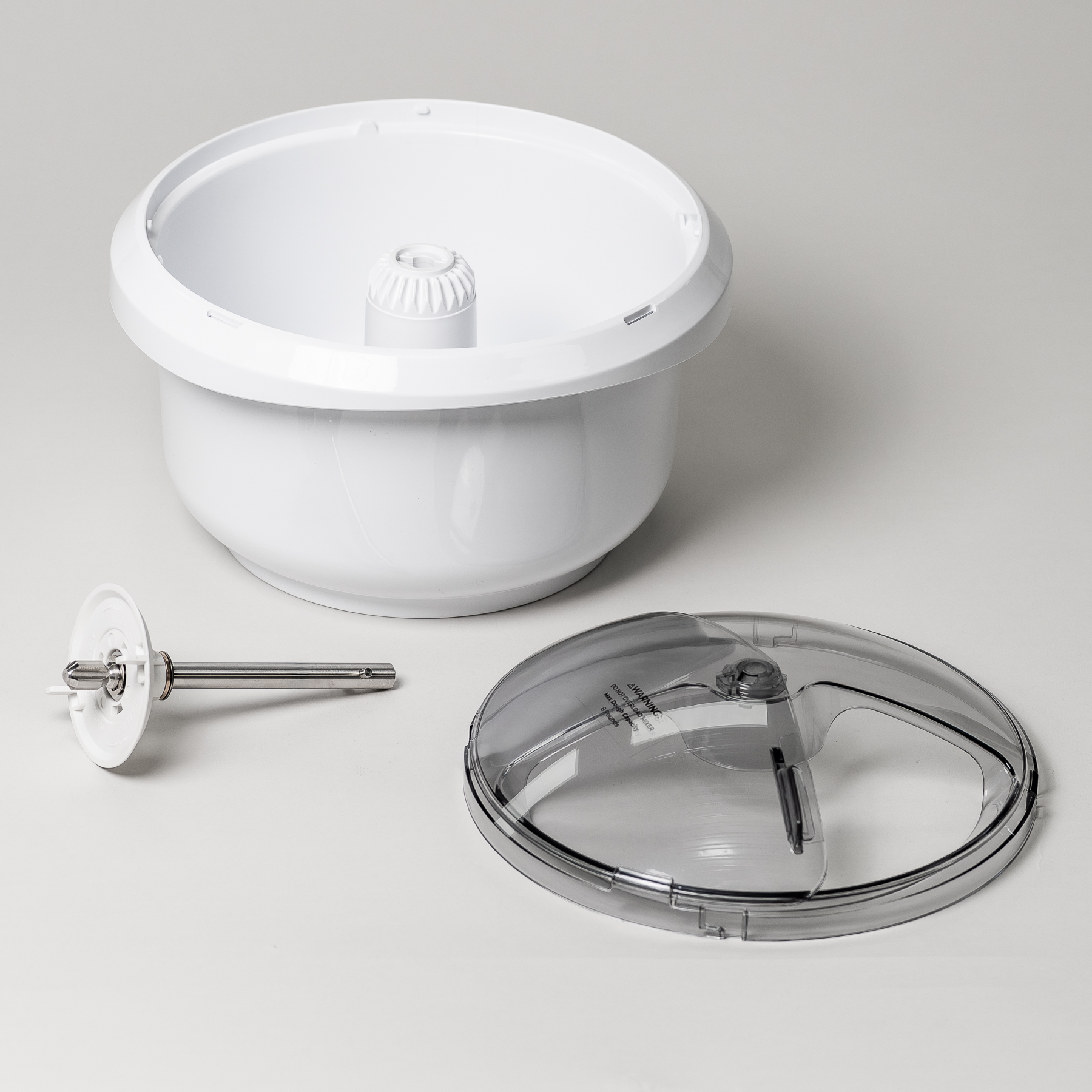 NutriMill artiste bowl shell, drive shaft, and sliding lid disassembled