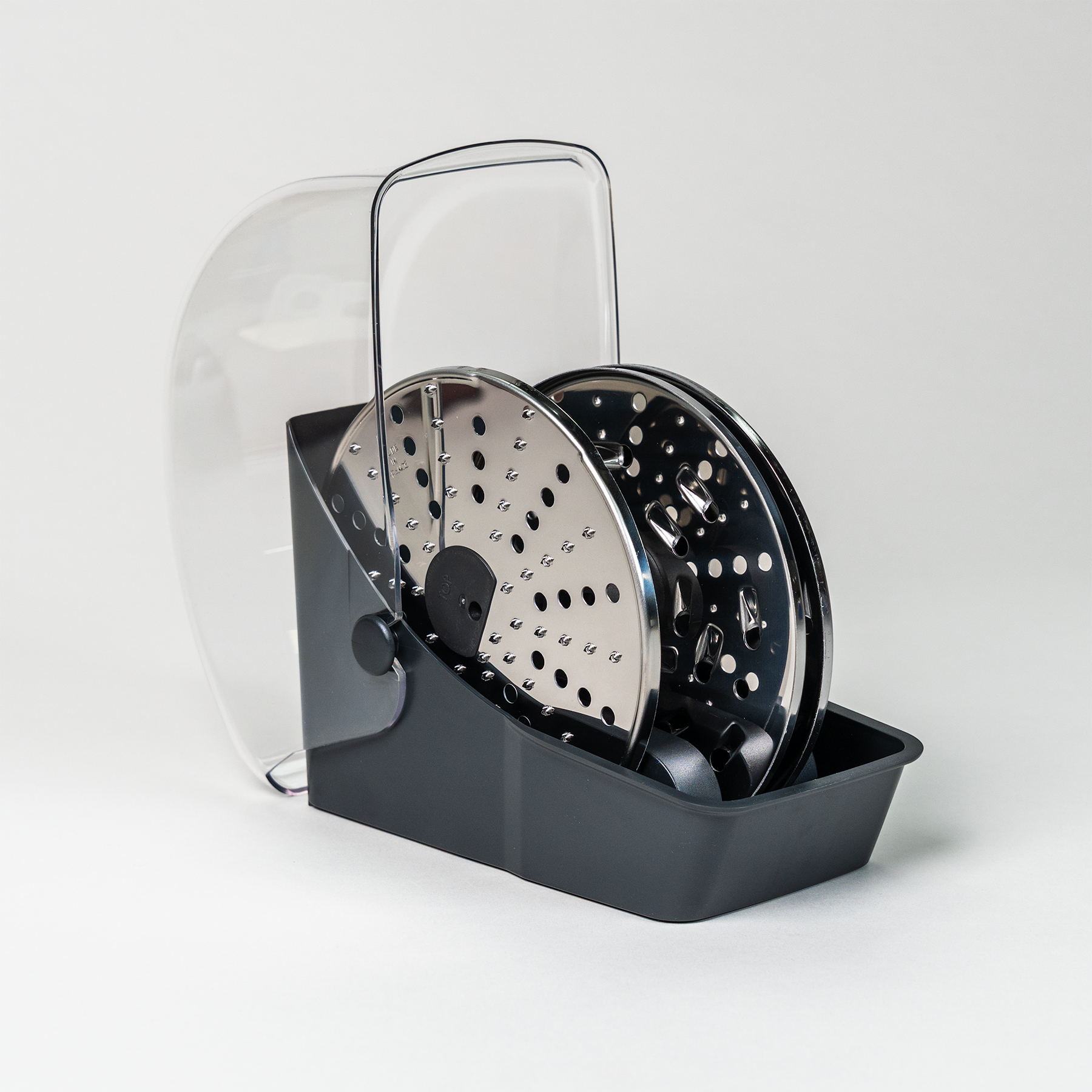 Magimix food processor premium kit on a grey background