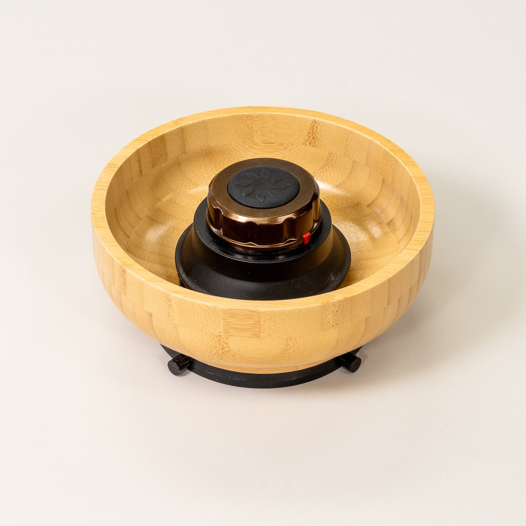 NutriMill harvest bronze trim hopper bowl on grey background