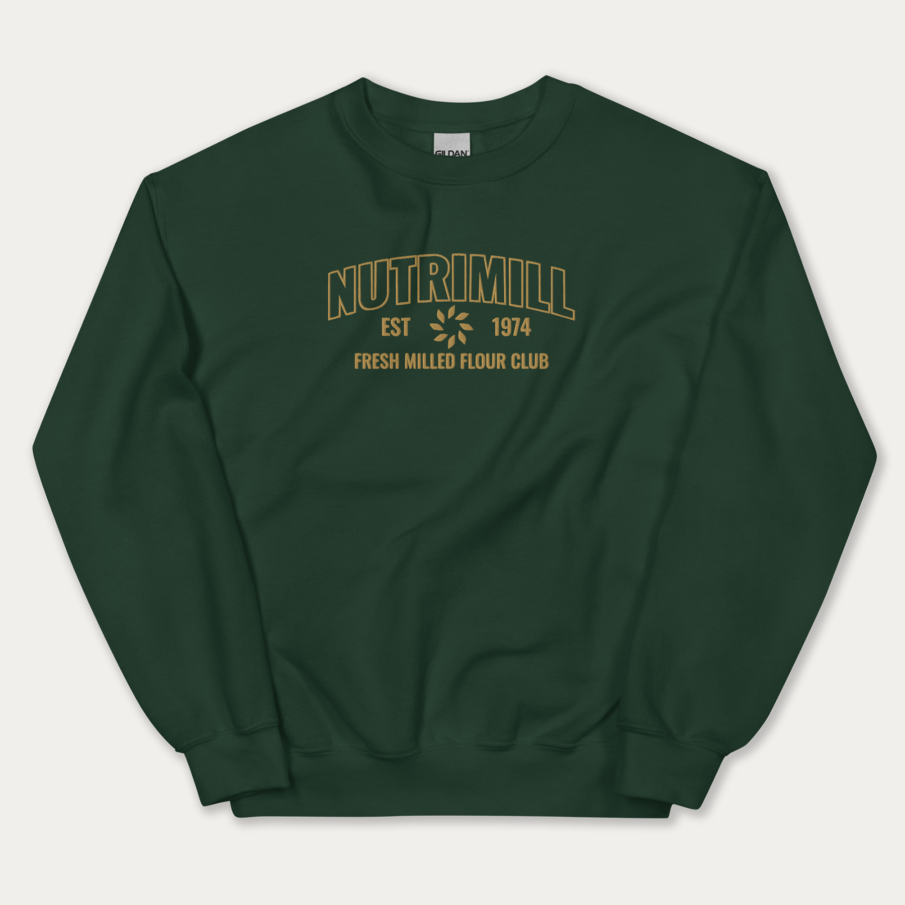 Green NutriMIll sweatshirt with yellow NutriMill logo and "fresh milled flour club" and established date