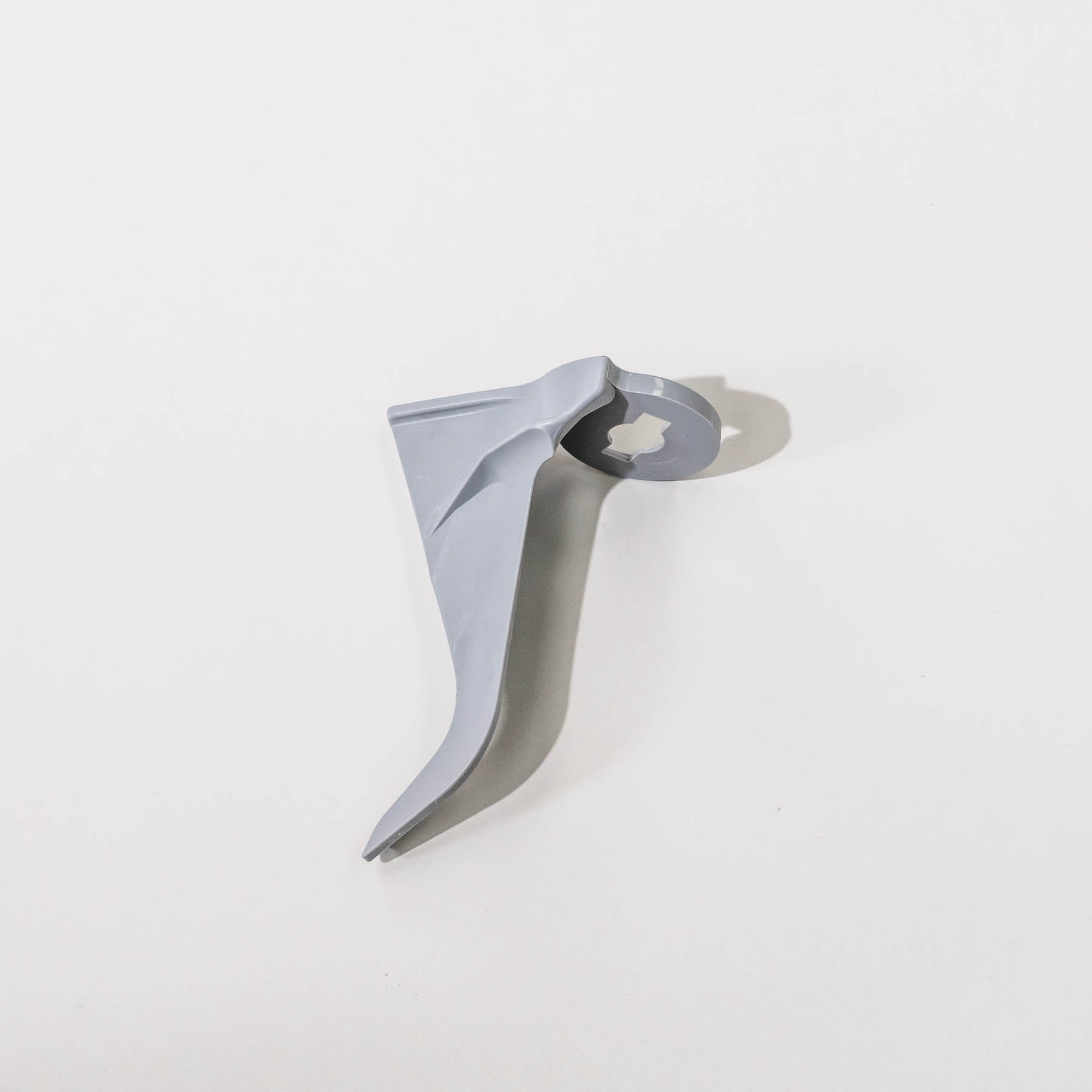 NutriMill dough hook on a grey background