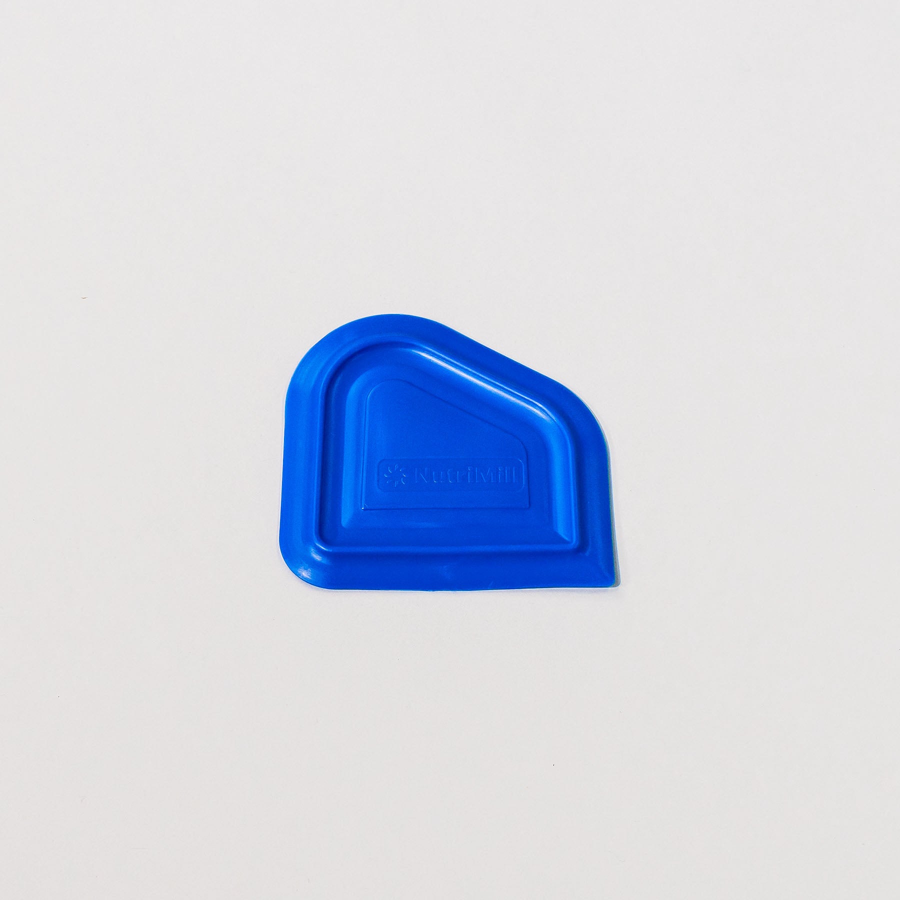 A blue bowl scraper on a white background.