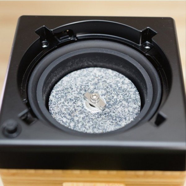 corundum mill stone in the NutriMill harvest grain mill