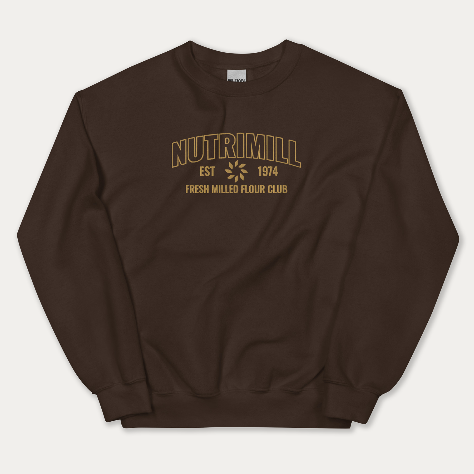 Brown NutriMill sweatshirt with yellow NutriMill logo and "fresh milled flour club" and established date