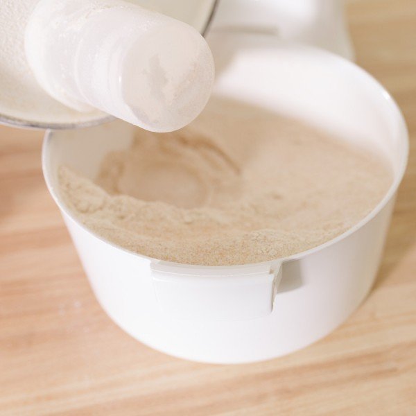 fresh milled flour in the nutrimill classic grain mill canister